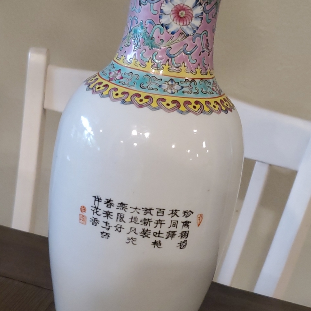 A ceramic japan vase with pea cocks